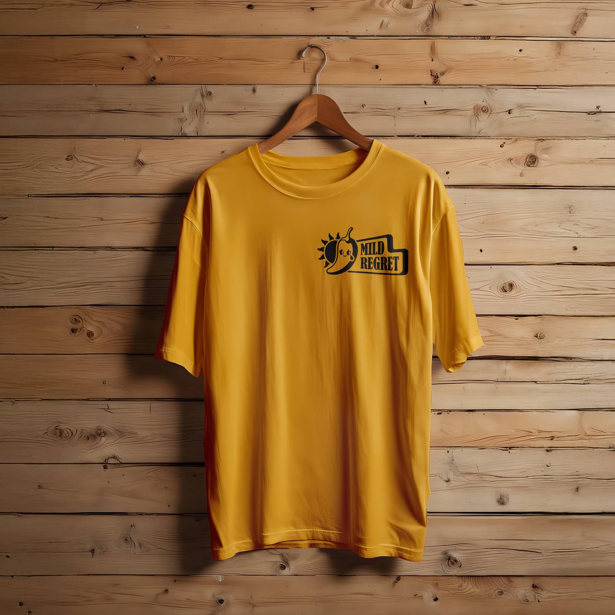 A yellow T-shirt featuring the Mild Regret logo in the upper corner.