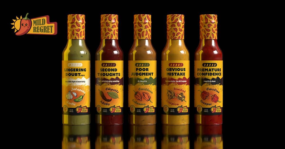Mild Regret hot sauce lineup on a black background with dramatic yellow accent lighting.
